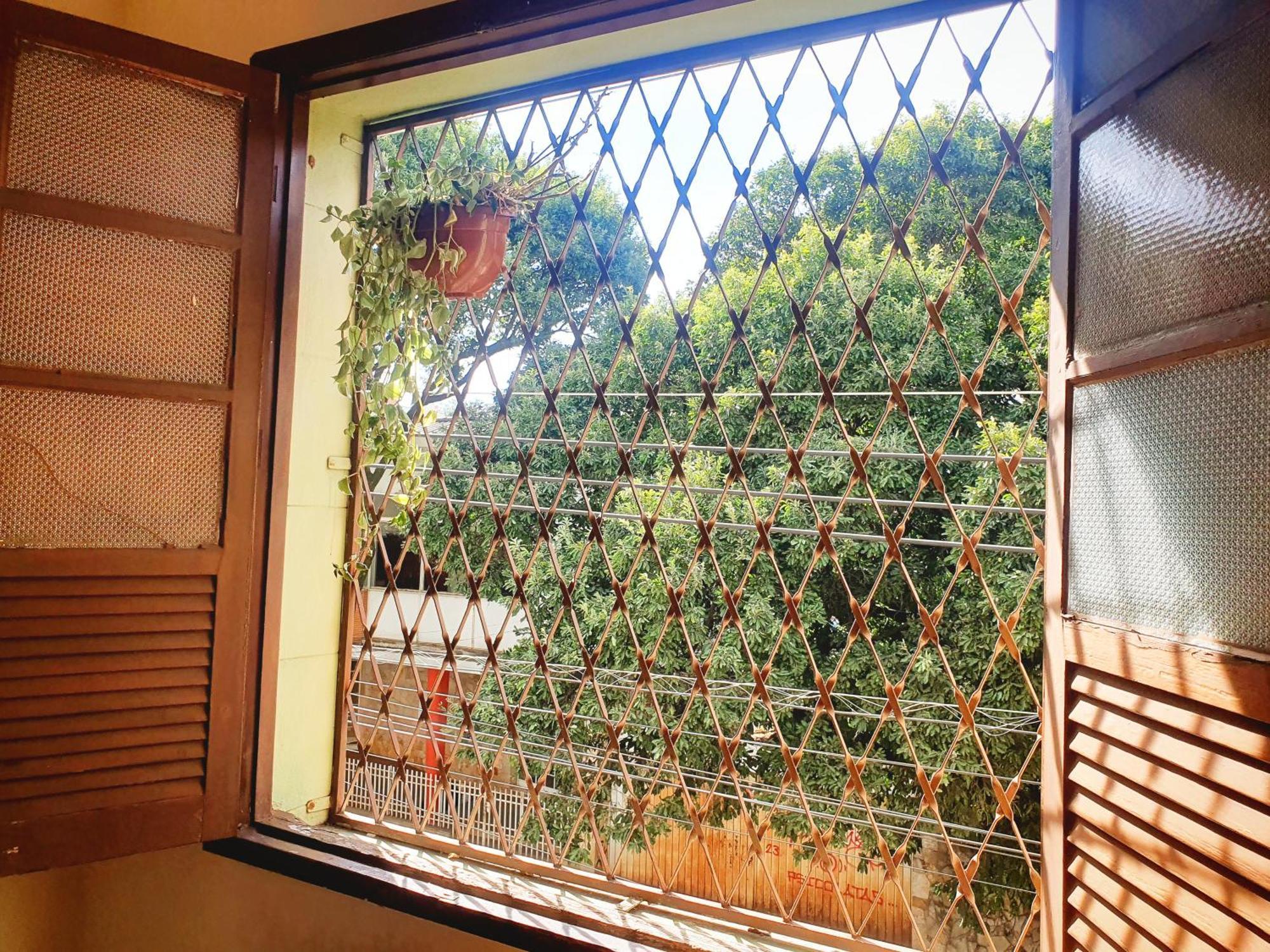 Quarto Casal Com Janela Casa Caramel Belo Horizonte Esterno foto